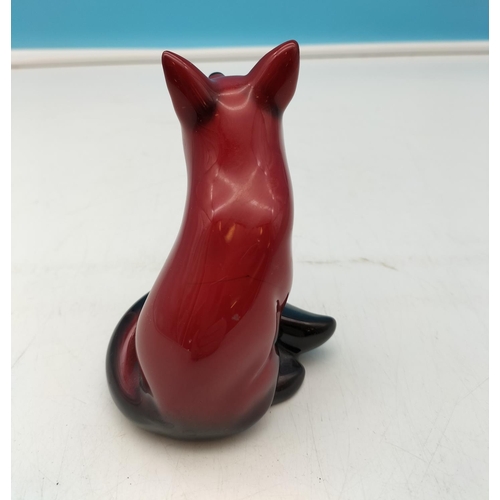 411 - Royal Doulton Flambe Sitting Fox Figure. 11.5cm Tall