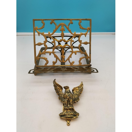 544 - Brass Fold Down Book Holder plus Eagle Door Knocker. Largest 21cm High, 26cm x 24cm.