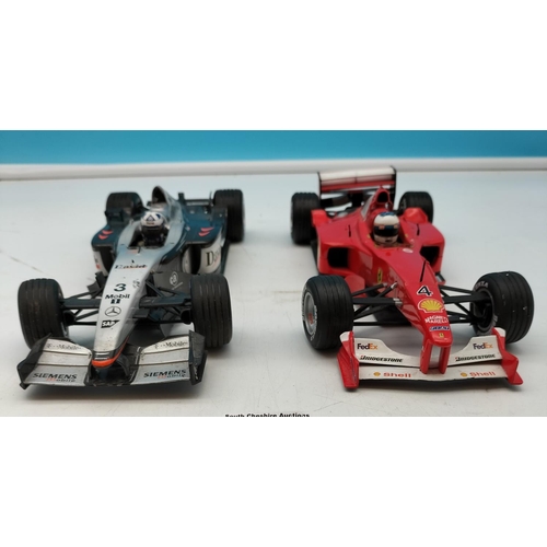 587 - 1:18 Scale Model F1 Cars (2) - 1 Hotwheels and 1 Minichamps. 26cm long.