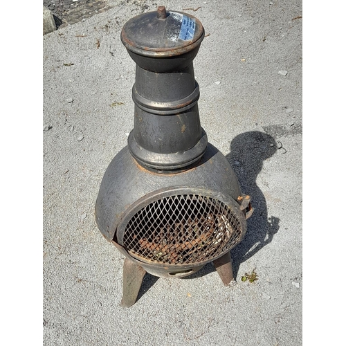 922 - Black Metal Chimenea. Hinge Requires Attention. 82cm High, 39cm Diameter. Collection Only.