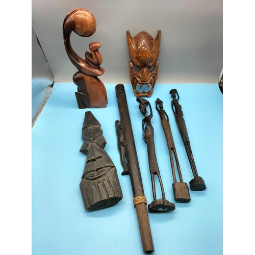 499 - Collection of African and Other Craved Wooden Items including Demon Wall Mask, Blow Pipe, etc.