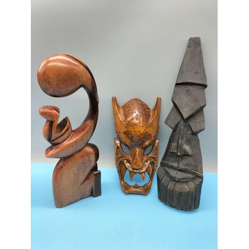 499 - Collection of African and Other Craved Wooden Items including Demon Wall Mask, Blow Pipe, etc.