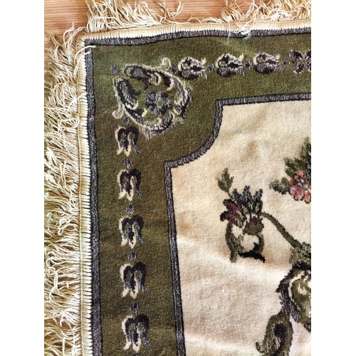 500 - Vintage Woollen Green and Floral Rug 134cm x 167cm.