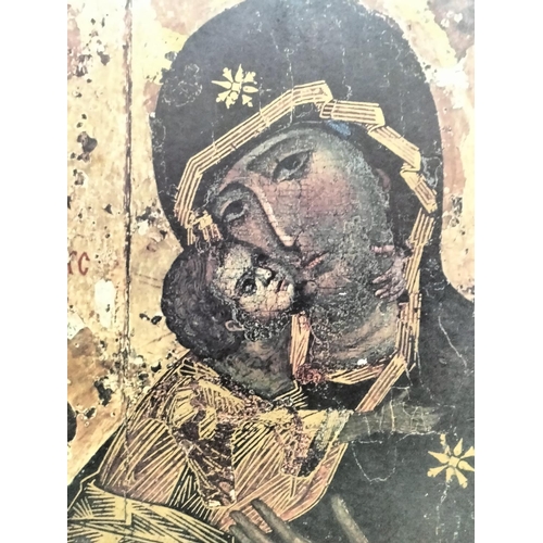 585 - Religious Madonna and Child Print on Board. 45cm x 29cm.