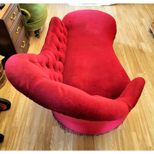 213 - Red Fabric Chaise Longue with Wooden Columned Legs on Castors. One Leg Loose Requires Pinning. lengt... 