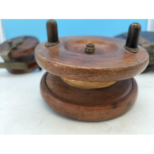 114 - Vintage Wood and Brass Fishing Reels. Largest Diameter 10cm.