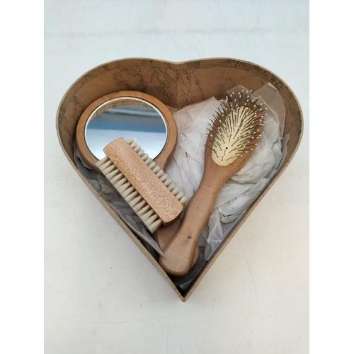 194 - Vintage Vanity Set in Heart Shaped Box to include Hairbrush, Mirror and Nail Brush.