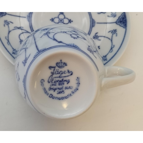 258 - German Democratic Republic Jager Eisenberg 'Original Blue Saks' Cups and Saucers (8). c1960-1989.