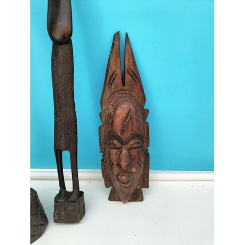 335 - Collection of African Items to include Figures and Masks. Tallest 57cm.