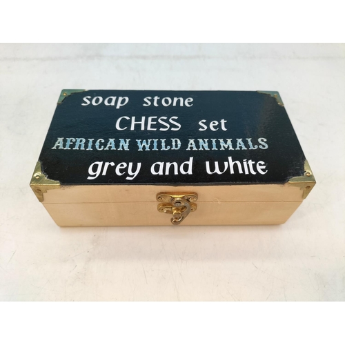 411 - Carved Soapstone African Animals Chess Pieces with Board. Tallest Piece 8cm.