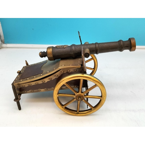 454 - Reproduction Powder Flask, Miniature Rifle plus Cannon Model. 15cm High, 28cm x 15cm.