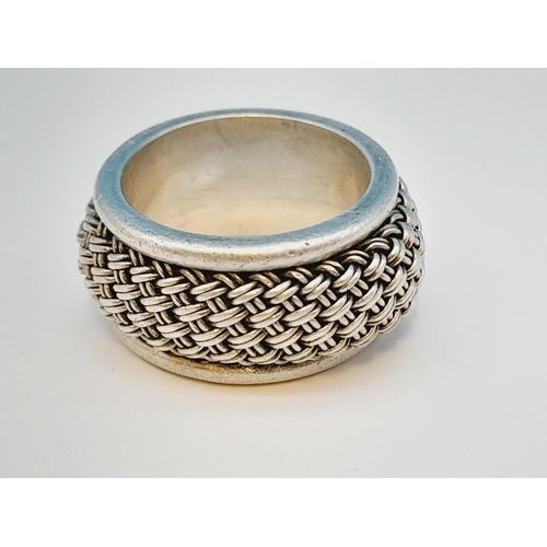 142 - 925 Silver Suarti Ring. 12.8 Grams. Size Q.