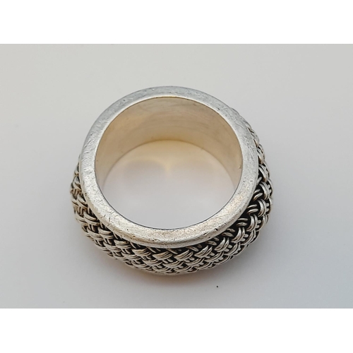 142 - 925 Silver Suarti Ring. 12.8 Grams. Size Q.