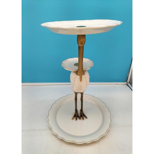 153 - Anthropologie Style Gold and White Stork Cake Stand. 43cm Tall, 31cm Diameter.