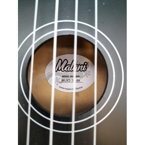 220 - Malani Black Ukulele in Case. 54cm Long.