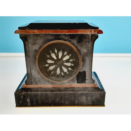 338 - French Slate and Marble Mantel Clock with Key. W/O. 16cm High, 17.5cm x 9cm.