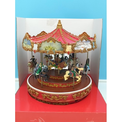 17 - Boxed (Opened but Never Used) Mr Christmas Triple Decker Carousel.