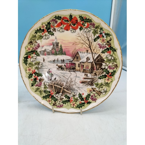 282 - Royal Albert 21.5cm Christmas Plates (2) - 'The Skating Pond' and 'The Coaching Inn'.