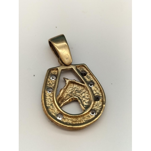 30 - 9ct 375 Gold, .800 Silver Plate and Cubic Zirconia Horseshoe with Horse Pendant. 6.5 Grams.