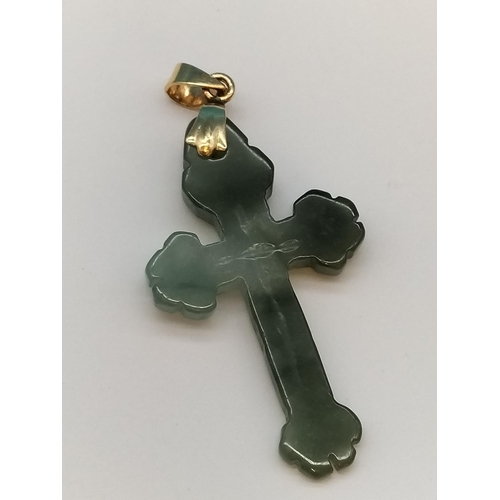 36 - 18ct Gold Shank with Jade Cross 4cm x 2cm.