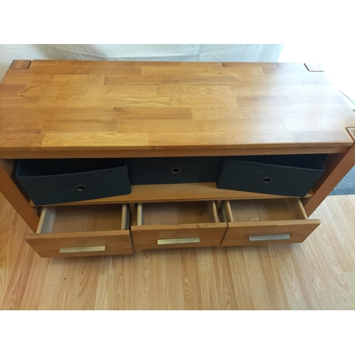 369 - Royal Oak Three Drawer Sideboard/TV Unit. 52cm High, 110cm x 42cm. Collection Only.