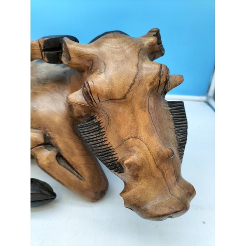 43 - Large Carved Hardwood Warthog Sculpture. Approx 21cm High, 53cm x 18cm.