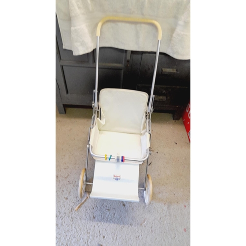 479 - Vintage 1960's Triang Foldable Doll's Pushchair. 70cm x 27cm x 42cm. Collection Only.