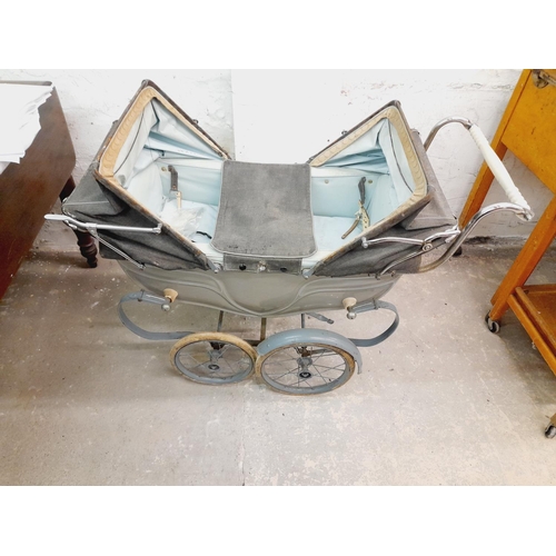 498 - Vintage Silver Cross Twin Coach Built Doll's Pram. 88cm x 88cm x 40cm. Collection Only.