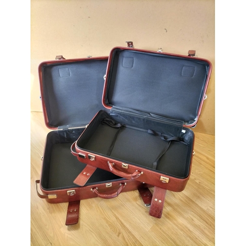 572 - 2 Graduated St Michael Burgundy Leatherette Suitcases. Largest 75cm x 50cm x 20cm. Collection Only. ... 