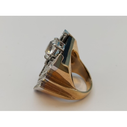 587 - T.C.B. (Taking Care of Business) Elvis Presley Gold Plate and Cubic Zirconia Ring. Size Y.