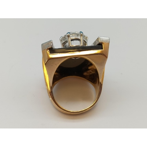 587 - T.C.B. (Taking Care of Business) Elvis Presley Gold Plate and Cubic Zirconia Ring. Size Y.