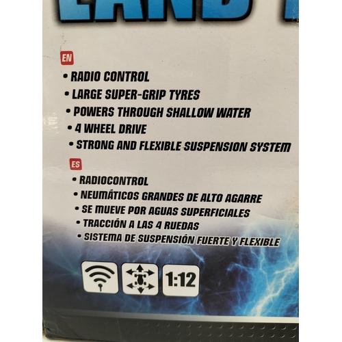 606 - Boxed New 'Water and Land' Remote Control Racing 4 x 4 Truck