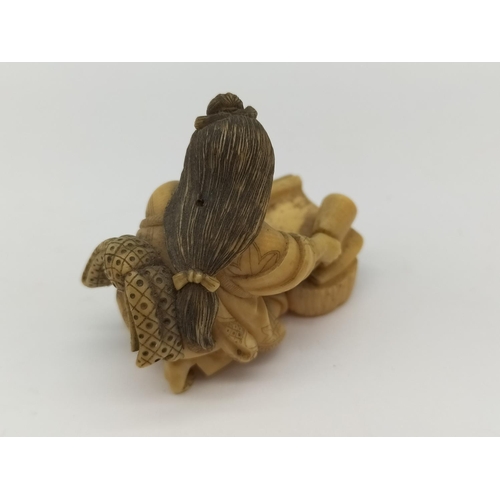 69 - Japanese Netsuke Figure with Character Mark to base. 4cm Long.