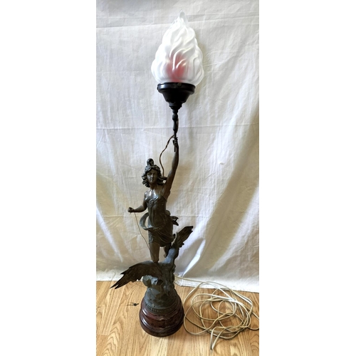 9 - Spelter Figure of a Lady Riding an Eagle Lamp Base on Wooden Stand. 95cm Tall. Collection Only.