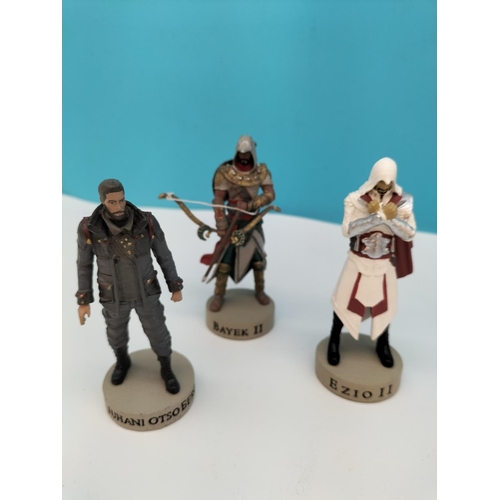 128 - Ubisoft Assassins Creed Figures (9) to include Juno, Cleopatra, Kassandra, etc. Some Damages. Approx... 