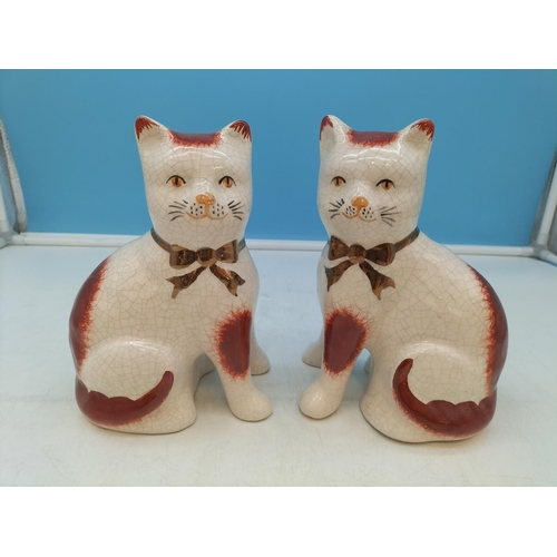 154 - Pair of William Kent Staffordshire Cats. 19cm Tall.