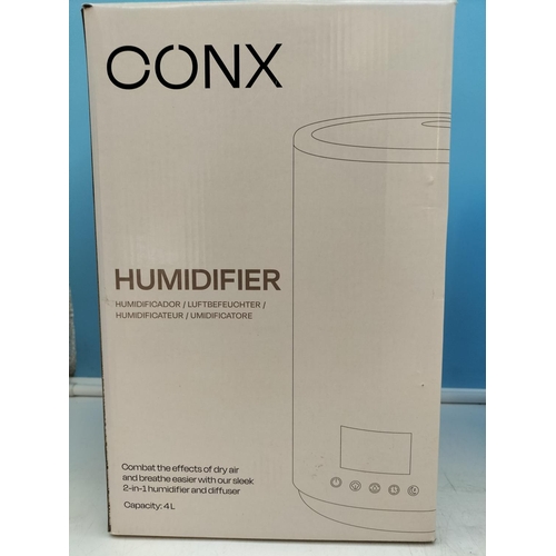 265 - New in Box Conx 4 Litre Humidifier plus Sealed Desk Top Punch Ball.