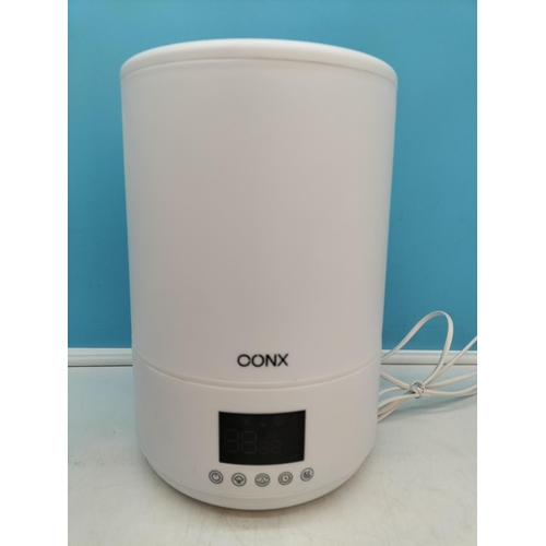 265 - New in Box Conx 4 Litre Humidifier plus Sealed Desk Top Punch Ball.