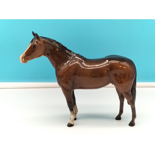 33 - Beswick Figure of a Brown Horse. 20cm High x 24cm.