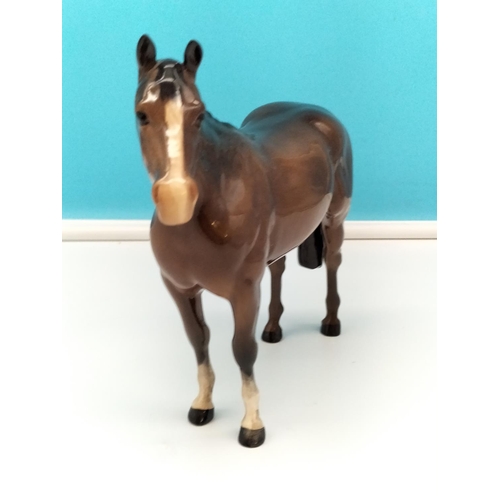 33 - Beswick Figure of a Brown Horse. 20cm High x 24cm.