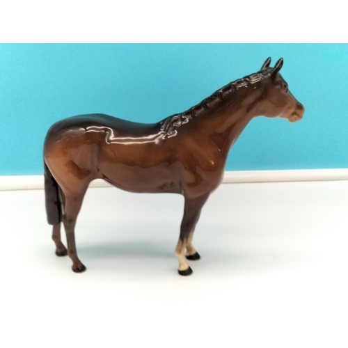 33 - Beswick Figure of a Brown Horse. 20cm High x 24cm.