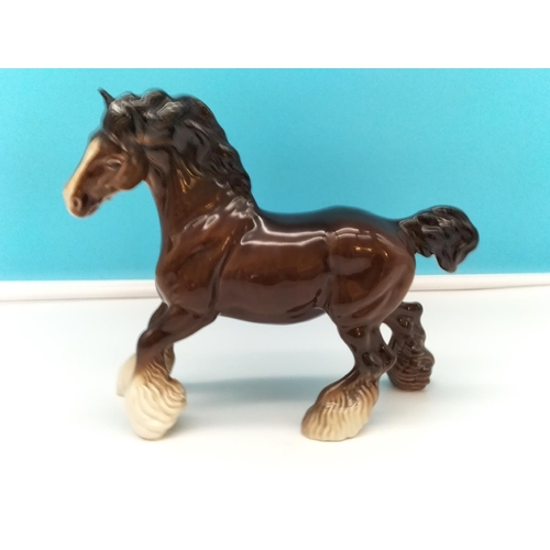 65 - Beswick Figure of a Cantering Shire. 22cm High x 26cm Long.