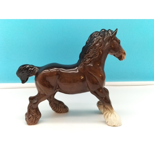 65 - Beswick Figure of a Cantering Shire. 22cm High x 26cm Long.