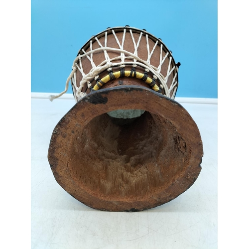 247 - African Djembe Drum (possibly Palm Wood or Coconut) with Hide Drumhead, slight A/F. 24cm High, 20cm ... 