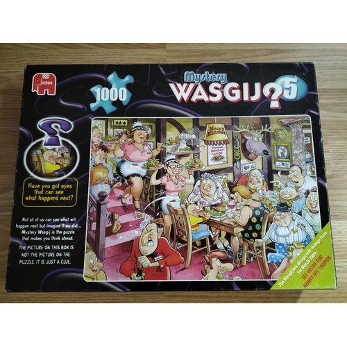 270 - 7 x WASGIJ 'Mystery' 1000 Piece Jigsaw Puzzles to include Nos 5,6,10,11,17,18,19.