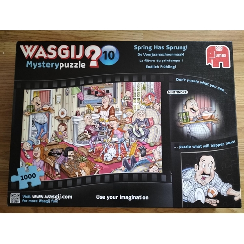 270 - 7 x WASGIJ 'Mystery' 1000 Piece Jigsaw Puzzles to include Nos 5,6,10,11,17,18,19.