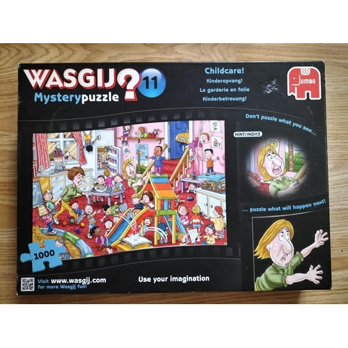 270 - 7 x WASGIJ 'Mystery' 1000 Piece Jigsaw Puzzles to include Nos 5,6,10,11,17,18,19.