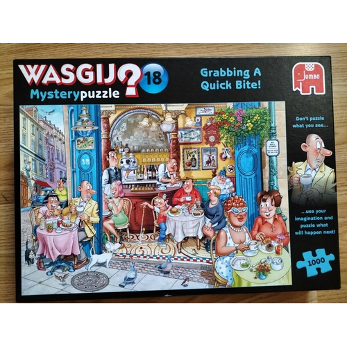 270 - 7 x WASGIJ 'Mystery' 1000 Piece Jigsaw Puzzles to include Nos 5,6,10,11,17,18,19.