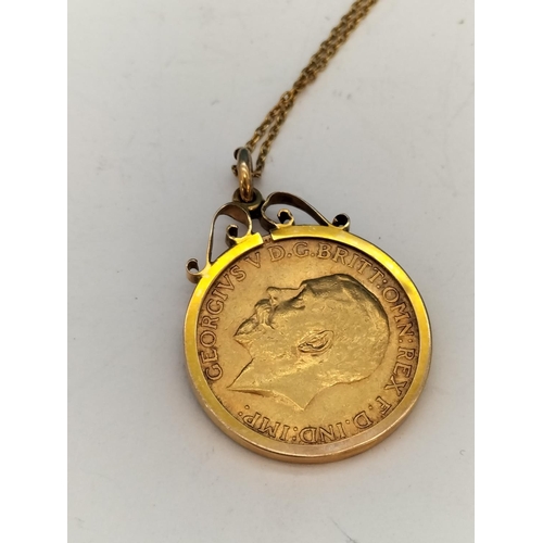 36 - George V 1913 Full Sovereign in 9ct Mount with Yellow Metal Chain. Total 10.8 Grams.