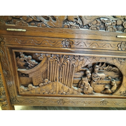 46 - Heavily Carved Oriental Blanket Chest/Storage Box. 59cm High, 107cm x 57cm. Collection Only.